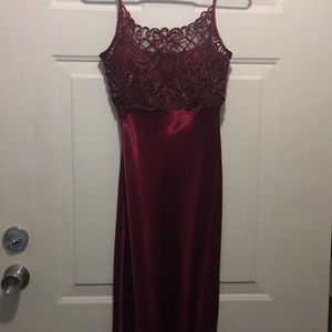 Satin floor length burgundy dress.